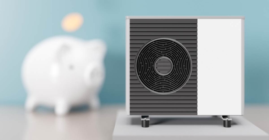 Heat pump and piggy bank - illustrating savings